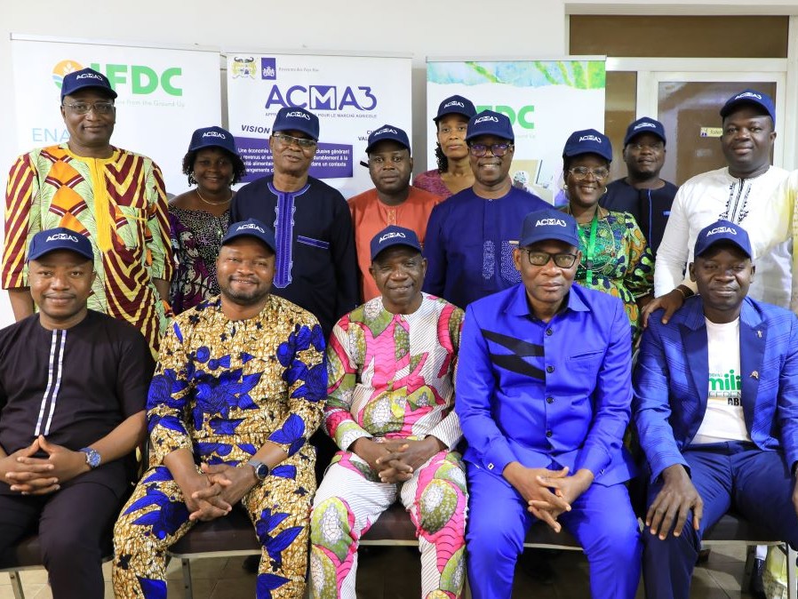 The ACMA program team and the mayors of the communes of Benin come together to celebrate the signing of the certificates of transfer for ACMA infrastructures by the mayors.