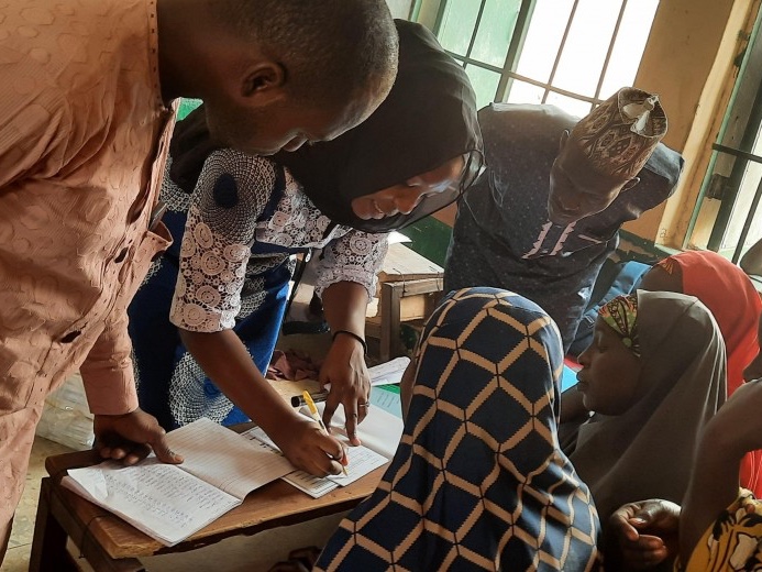 Female farmers receive training to improve their financial literacy