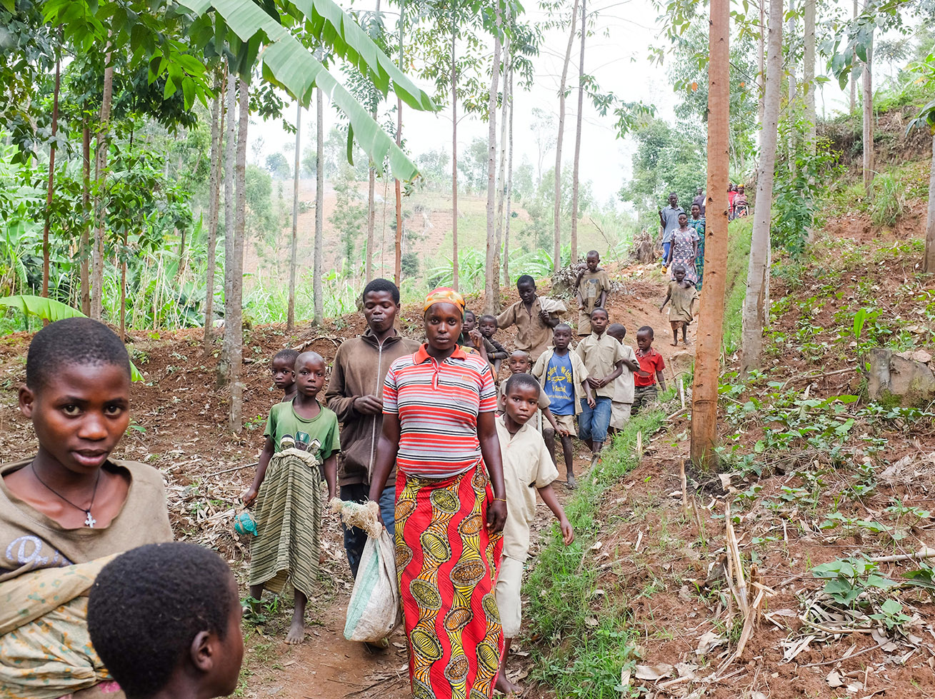 Farmers walking to a farm