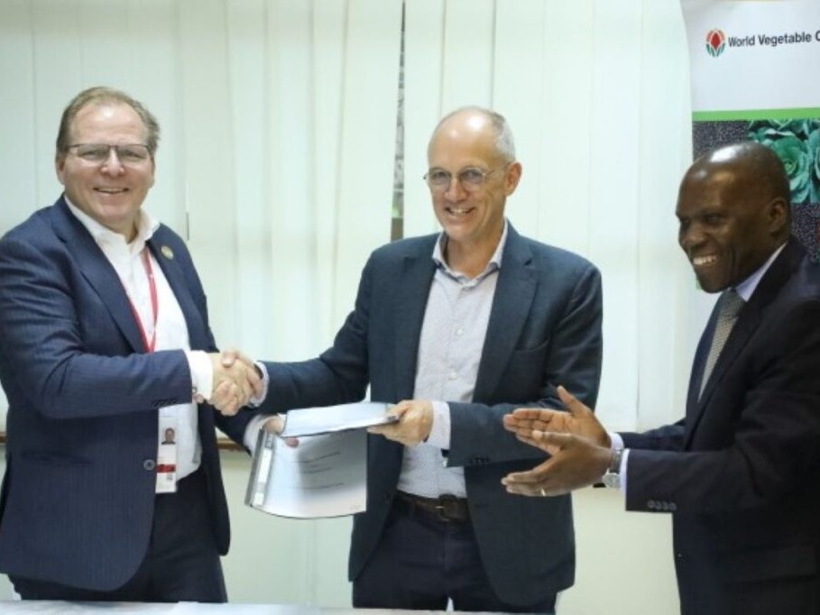 President and CEO of IFDC stands with representatives from WorldVeg