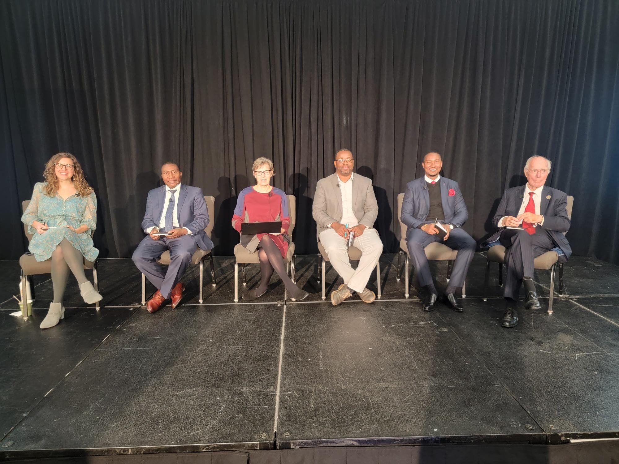 Borlaug panelists (left to right): Teresa Welsh, Dr. Godfrey Bahiigwa, Charlotte Hebebrand, Antony Chapato, Sebastian Nduva, and Rudy Rabbinge