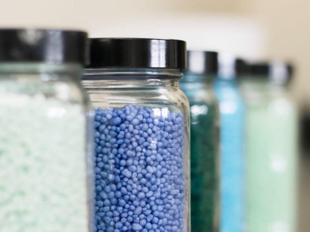 coated fertilizers in jars