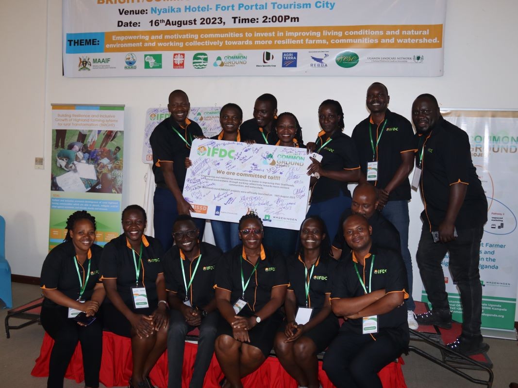 IFDC staff in Uganda come together to celebrate the launch of the BRIGHT and CommonGround projects.