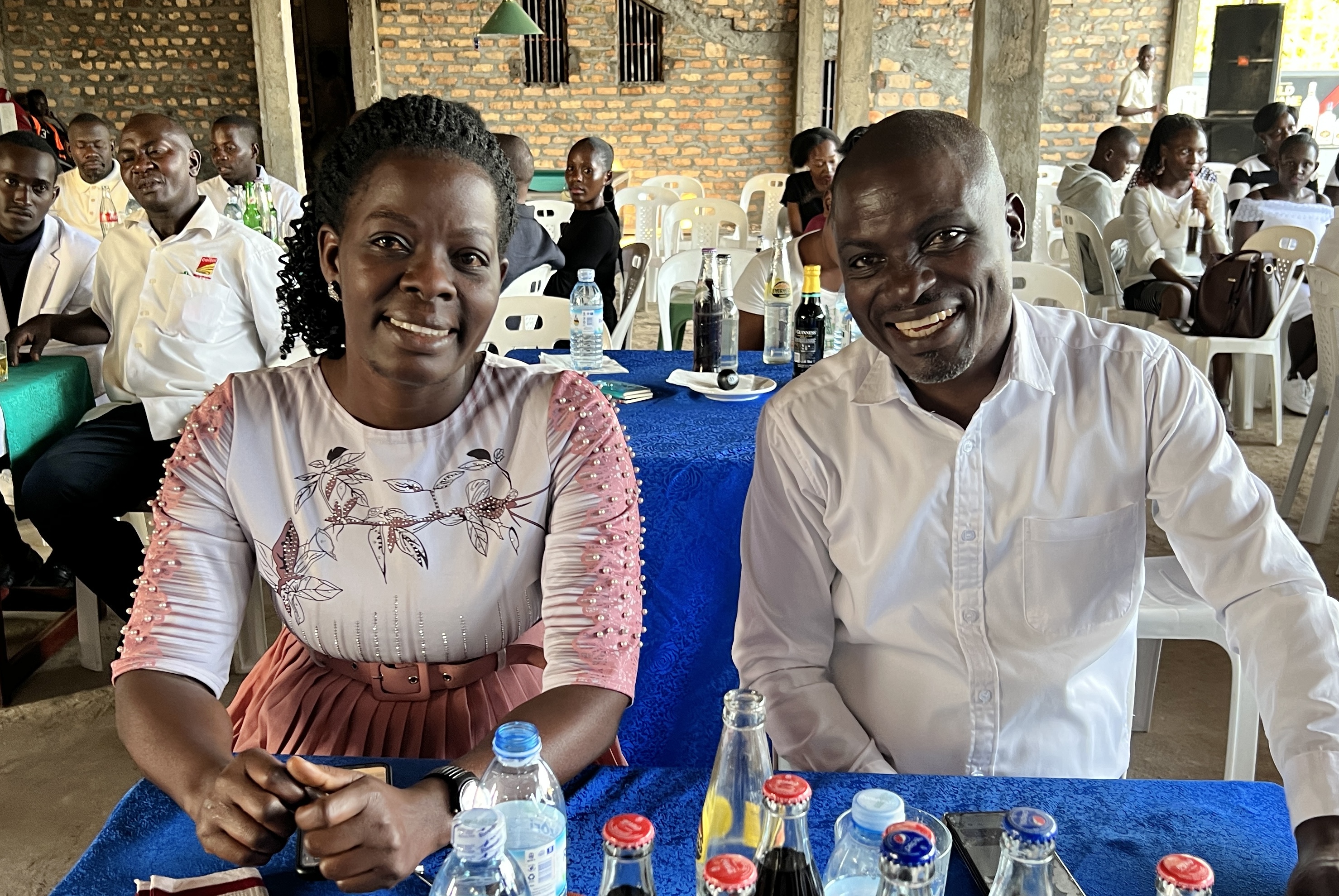 Senior Woman Norah and Headteacher Peter at a staff party