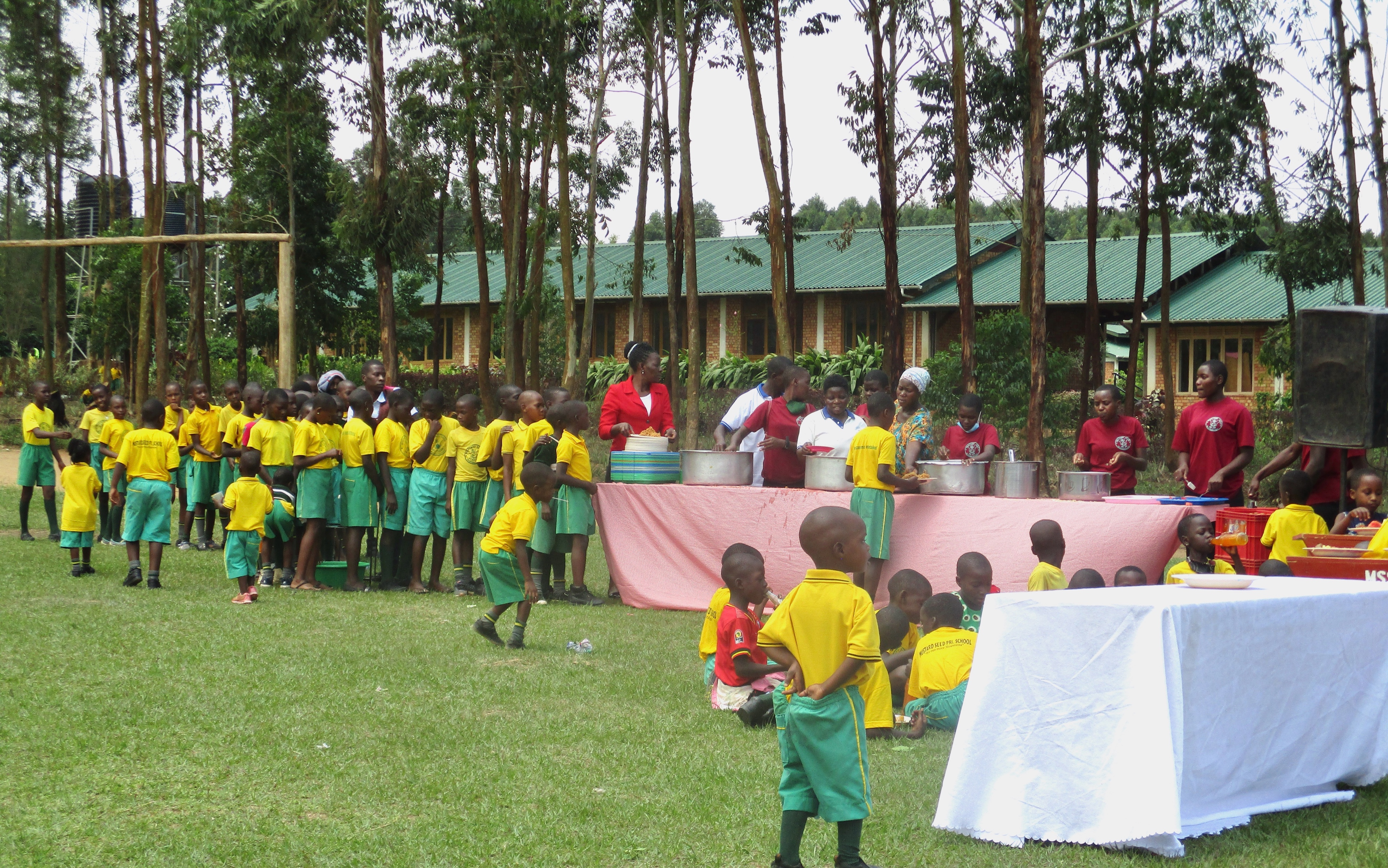 Primary School children- being served a big and delicious lunch.